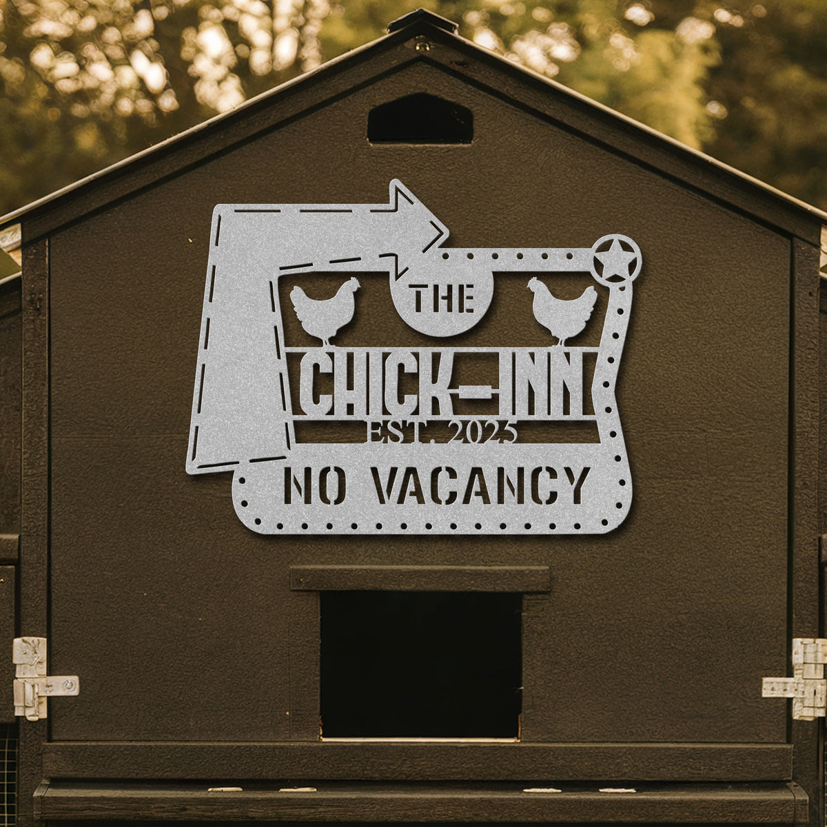 Brown chicken coop with a decorative metal sign featuring 'The Chick Inn' and 'No Vacancy'.