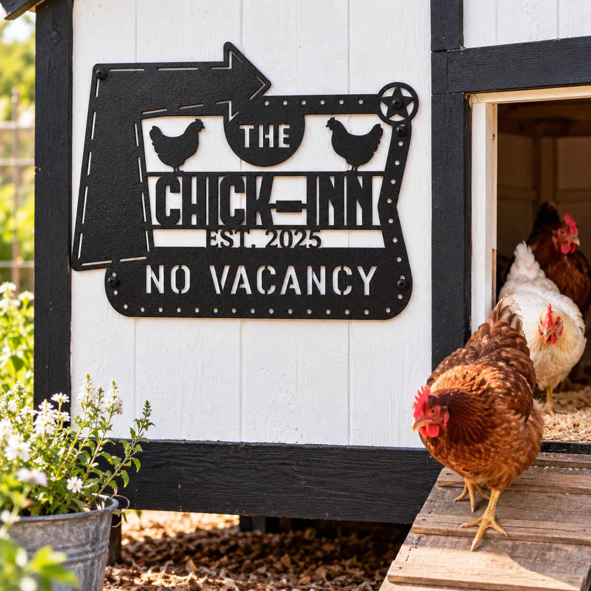 A decorative black metal sign reading 'THE CHICK-INN EST. 2025 NO VACANCY' mounted on a white chicken coop with black trim.