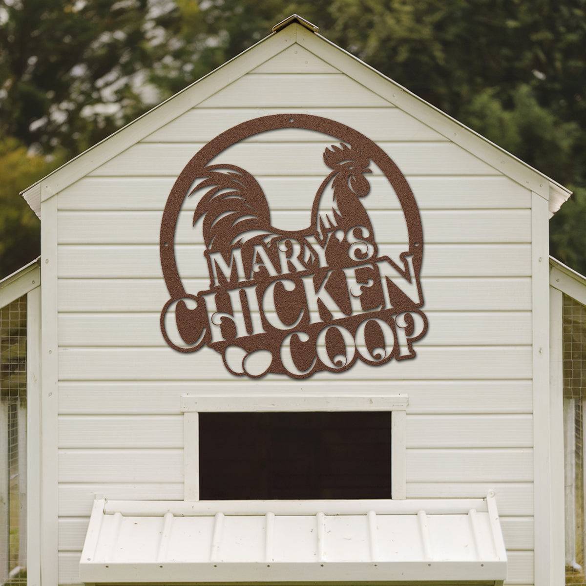White chicken coop with a rooster logo and 'Mary's Chicken Coop' text on a wooden background.