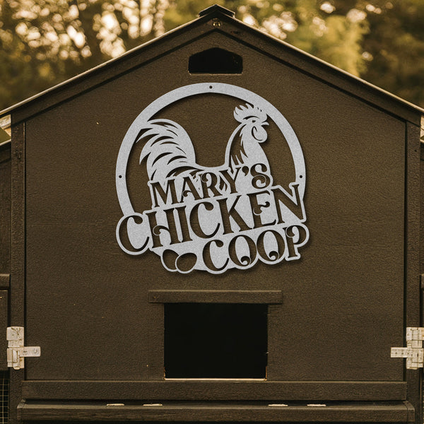 Chicken coop with 'Mary's Chicken Coop' sign on a wooden background