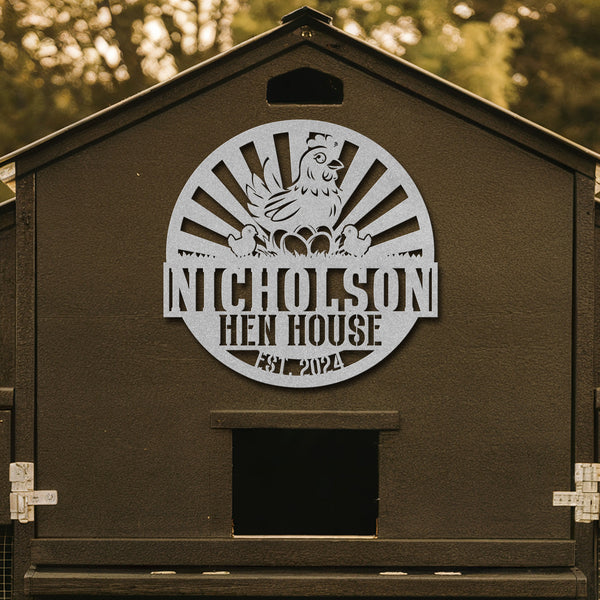 Brown hen house with a metal sign featuring a rooster and 'Nicholson Hen House' text.