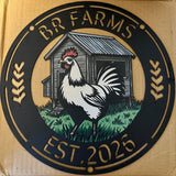 A circular metal sign for 'BR FARMS' featuring a graphic illustration of a white and black rooster standing in front of a gray wooden barn with green grass. The sign has a black background with gold-colored text reading 'BR FARMS' at the top and 'EST.