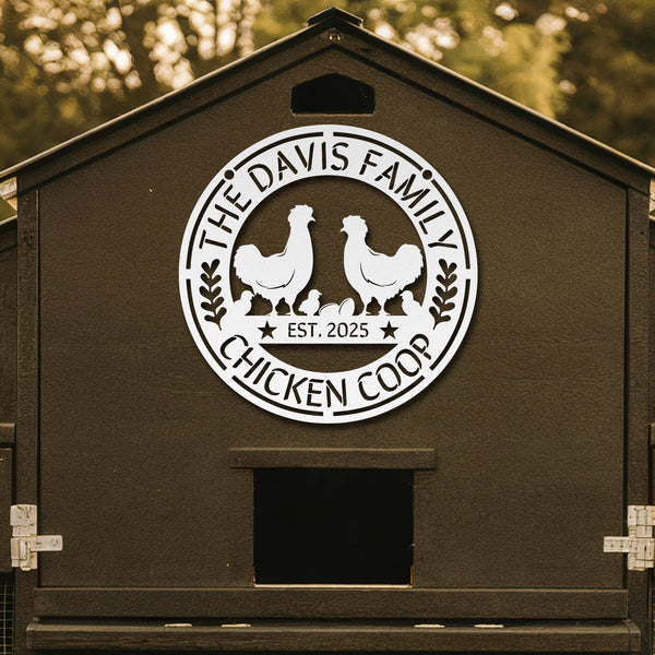 Chicken coop with 'The Davis Family Chicken Coop' logo on a wooden background