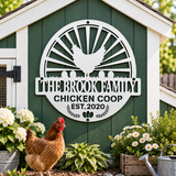 A white metal chicken coop sign mounted on a green wooden coop wall, featuring a rooster silhouette and the text 'THE BROOK FAMILY CHICKEN COOP EST. 2020'.